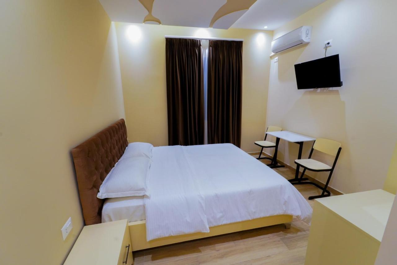 Sr99 Hotel Tirana Bagian luar foto