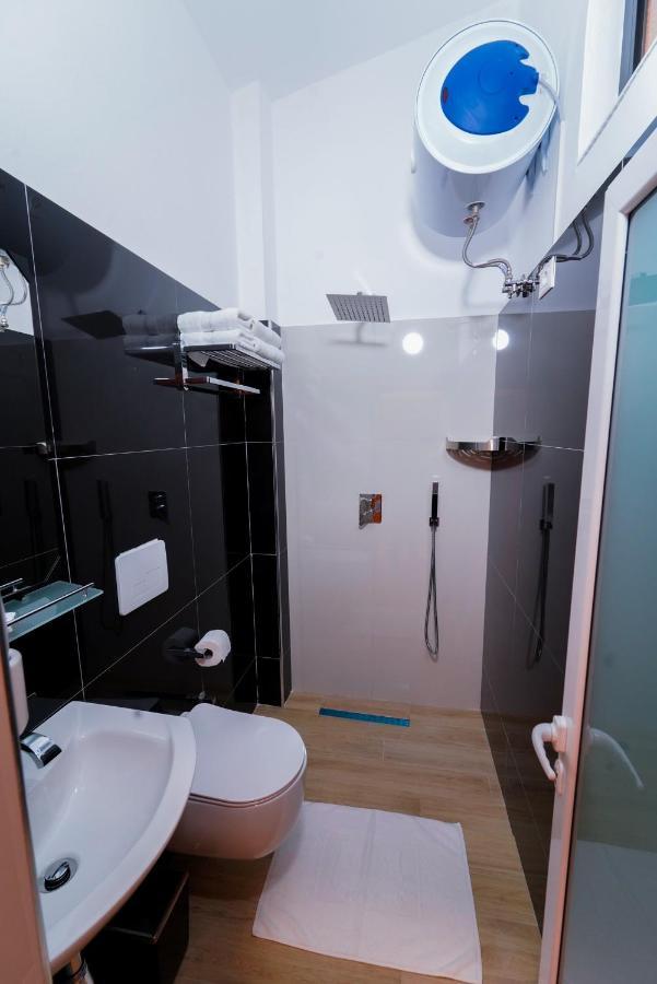 Sr99 Hotel Tirana Bagian luar foto