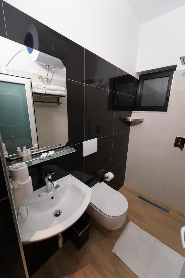 Sr99 Hotel Tirana Bagian luar foto